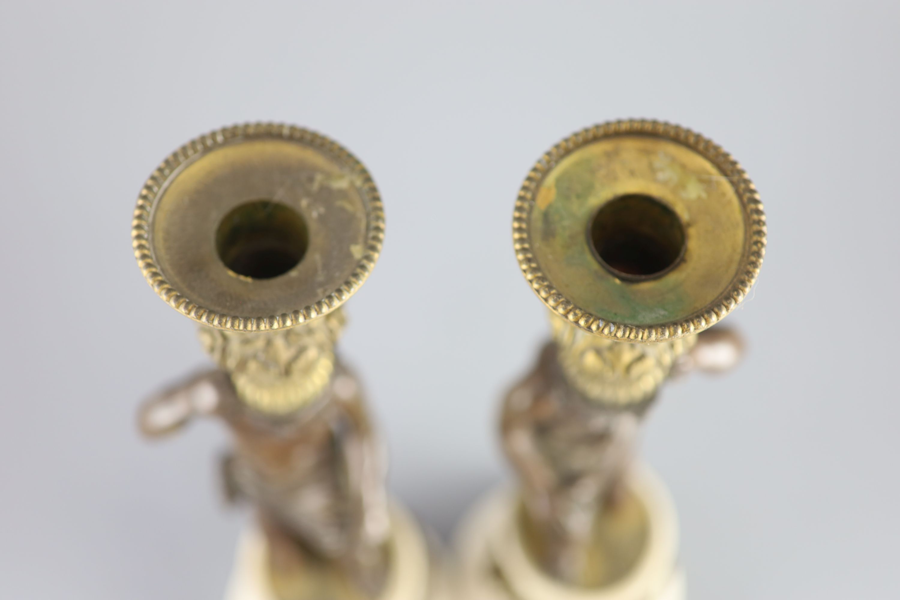 A pair of 19th century bronze and ormolu figurative candlesticks, 33cm high.